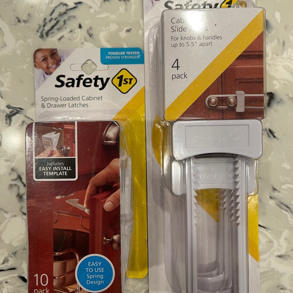 Safety First: spring loaded cabinet and drawer latches and cabinet slide locks